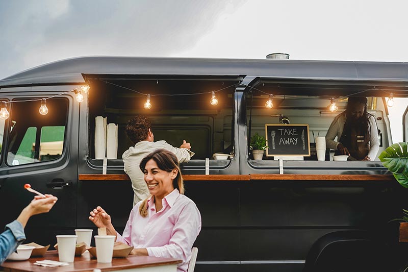 Food truck owner using Aloha Cloud POS system to take an order